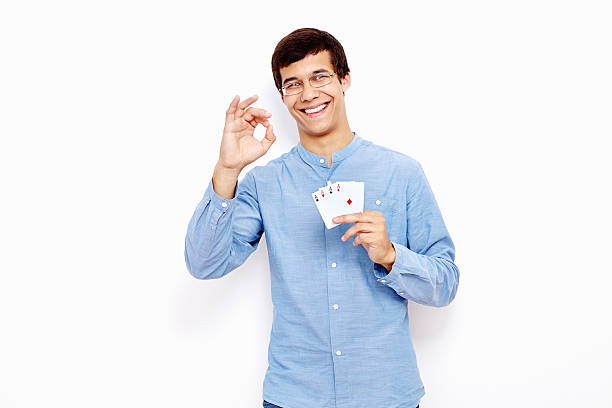 istock Guy with cards and okay sign 486100232