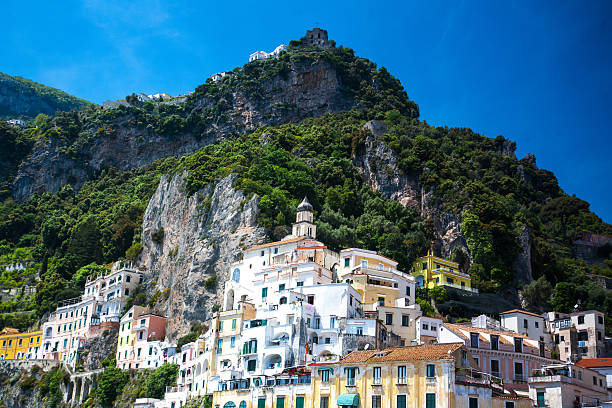 Scenic old houses on hill landmark in popular Italy resort, Amalfi in Campania.