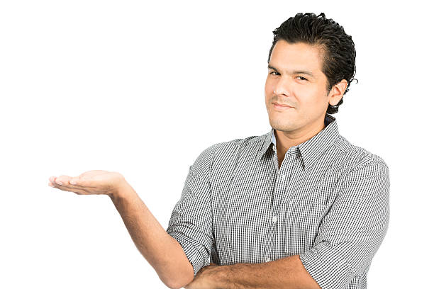 istock Grinning Latino Man Open Palm Showing Product H 486101282