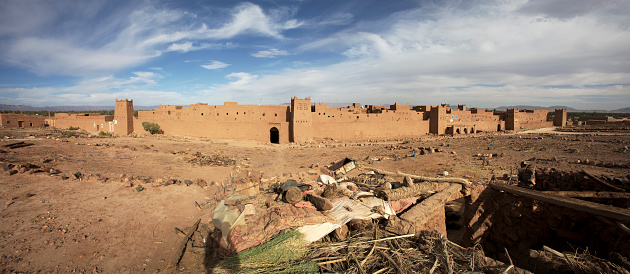 Moroccan village, Atlas mountains in the background.