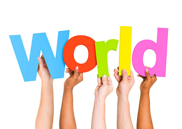 istock Multi-Ethnic Group Of People Holding The Word World 486105177