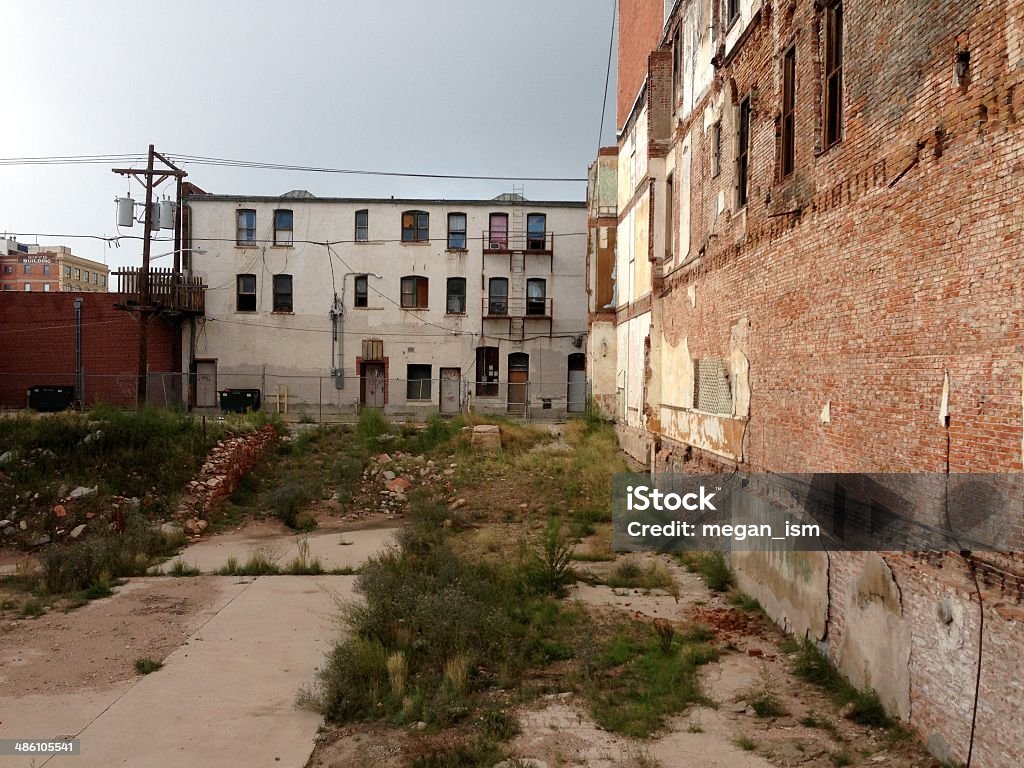 Urban Decay A grungy city scape with beautiful texture and color. Vacant Lot Stock Photo