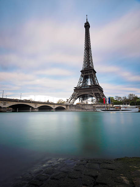 Eiffel tower and port on Seine river stock photo