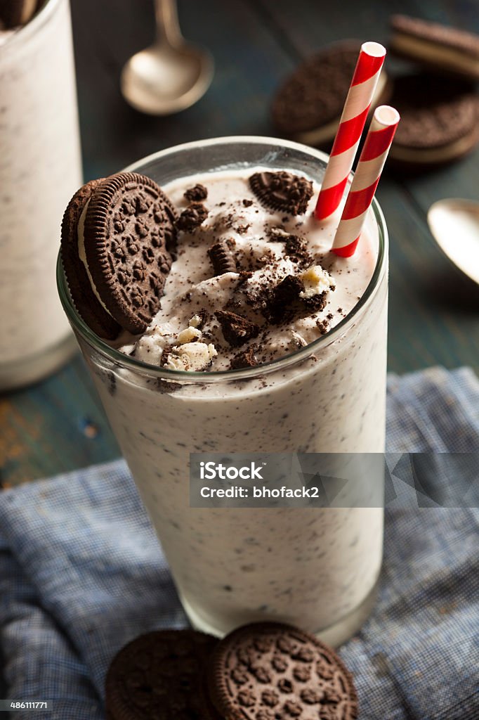 Homemade Cookies and Cream Milkshake in a Glass Homemade Cookies and Cream Milkshake in a Tall Glass Milkshake Stock Photo