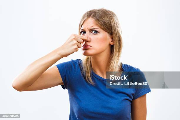 Unpleasant Smell Stock Photo - Download Image Now - Holding Nose, Nose, Women