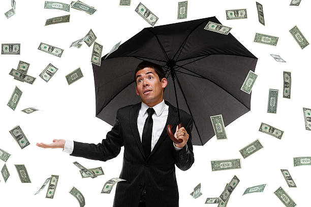istock Business man looking satisfied raining money 486126083