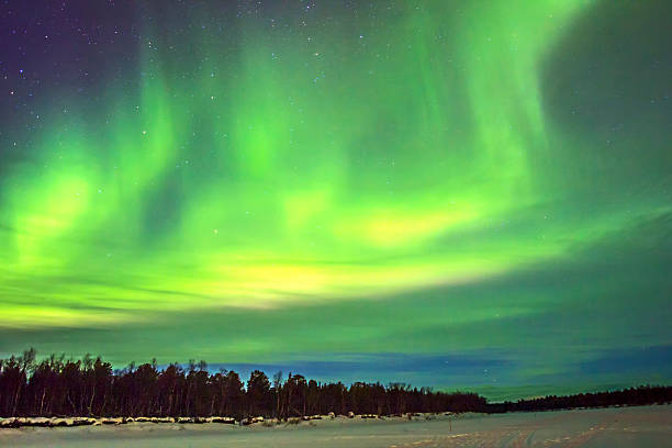 istock Northern Lights (Aurora borealis) over snowscape. 486126299