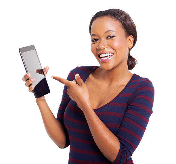 istock young african woman pointing at tablet computer 486127507