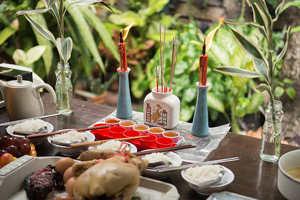 Bangkok, Thailand - August 28, 2015: Ceremony table seen during Yu Lan Jie or Hungry Ghost Festival. During the festival, people pay homage to their deceased ancestors which is believed to visit the living.