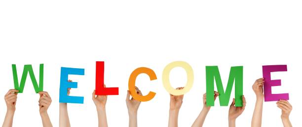 istock Hands Holding the Letters Welcome, Isolated 486133285