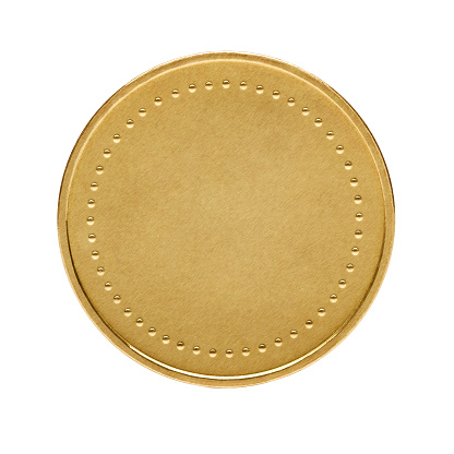 Close up of golden coin isolated on white background