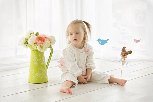 istock portrait of a girl with Down syndrome 486138043