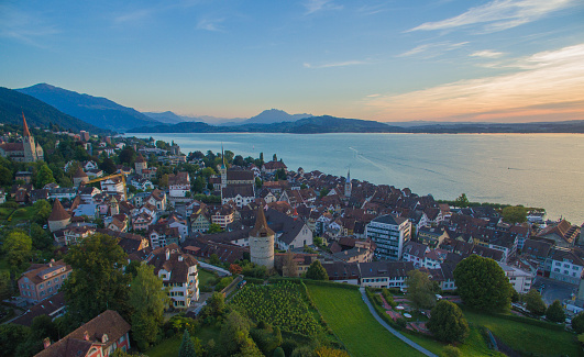 Beautiful city and lake Zug in central Switzerland, raw file shot with drone 150 meters from ground on safe and controlled flight