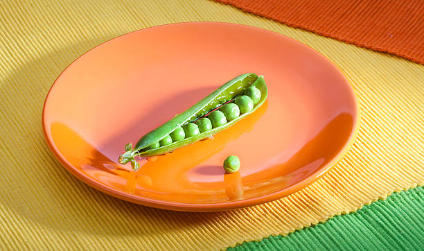 peas on plate stock photo