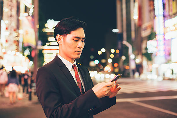 istock Businessman texting on the phone 486144464