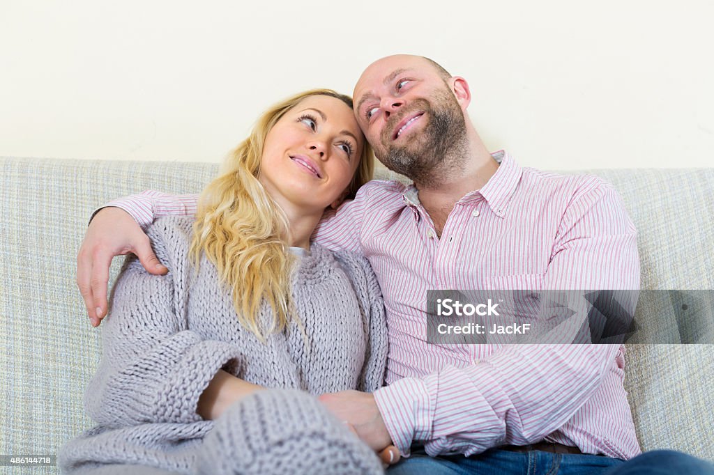 Happy loving couple Happy loving couple in home interior 2015 Stock Photo
