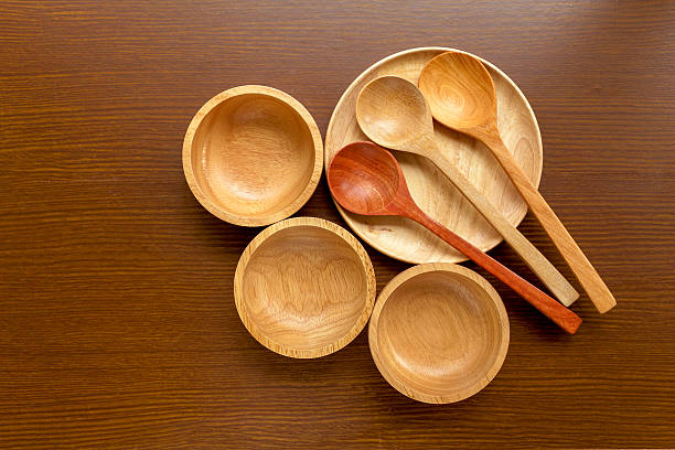 istock Wooden kitchen utensils on wood background 486150388