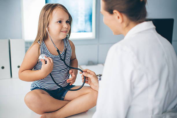 istock Cute girl at doctor's office. 486155964