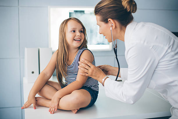 istock Cute girl at doctor's office. 486155966