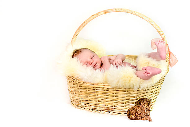 istock Happy newborn Baby in Basket 486161946