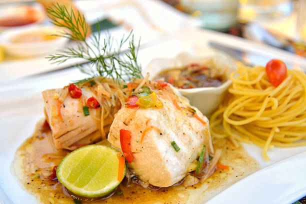 istock Steamed fish with spicy ginger sauce 486162232