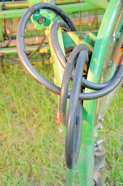 istock Old farm equipment hoses 486164431