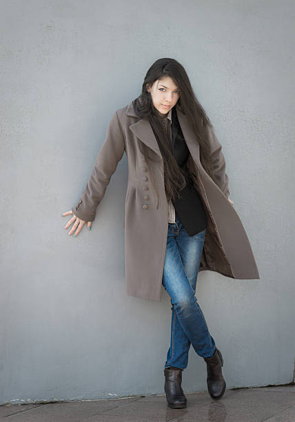 istock Young girl in coat. 486165211