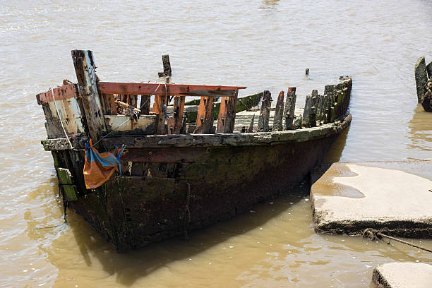 wooden shipwreck stock photo