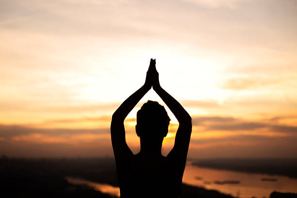 istock Girl doing yoga in sunset 486166511