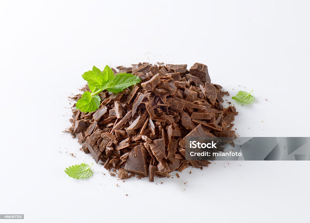 chopped chocolate heap of chopped chocolate on white background Brown Stock Photo