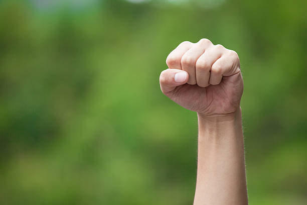 istock Person Clenching Fist 486167159