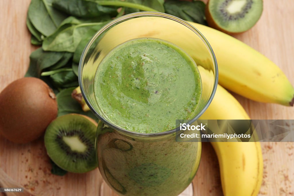 Green smoothie Green smoothie made with kiwi, spinach and banana Antioxidant Stock Photo