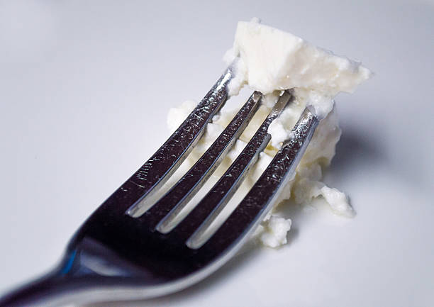 istock White Greek Feta Cheese on a Fork Rear View 486168236