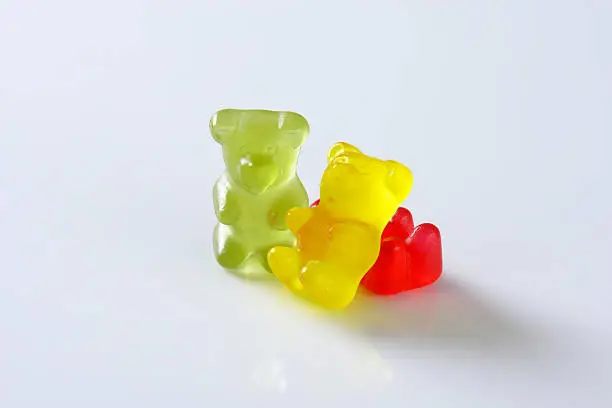 three gummy bears isolated on white background