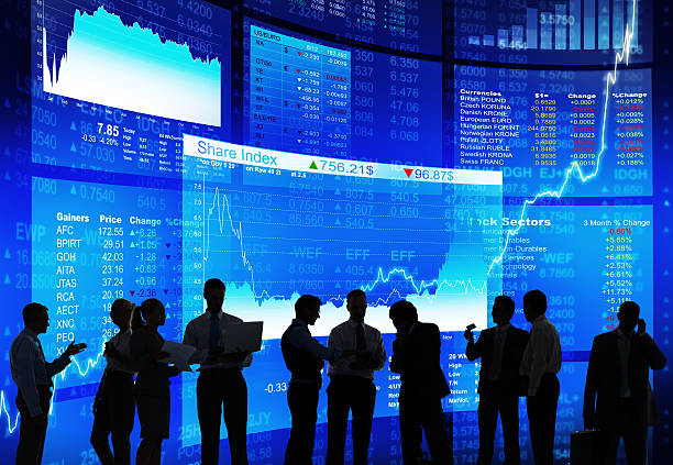 Stock Market Discussion Stock Market Discussion wall street lower manhattan stock pictures, royalty-free photos & images