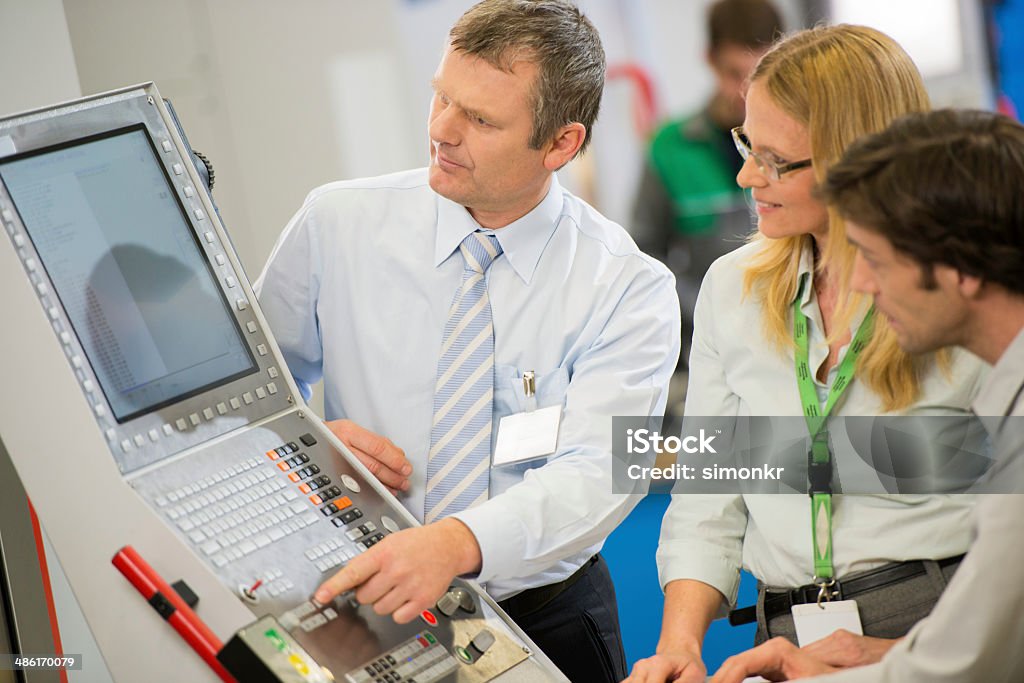 Engineers Programming A Cnc Machine Stock Photo - Download Image Now ...