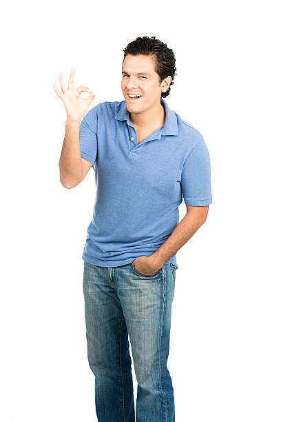istock Hispanic Male Smiling OK Hand Signal Right Blue 486172342