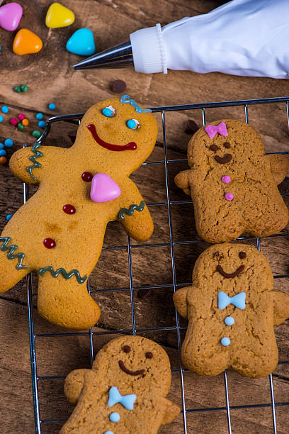 istock Decorating homemade gingerbread man for Christmas 486172742