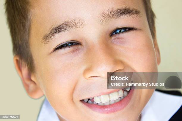 Closeup Portrait Of Little Boy With Content Smile Stock Photo - Download Image Now - 2015, 4-5 Years, 6-7 Years