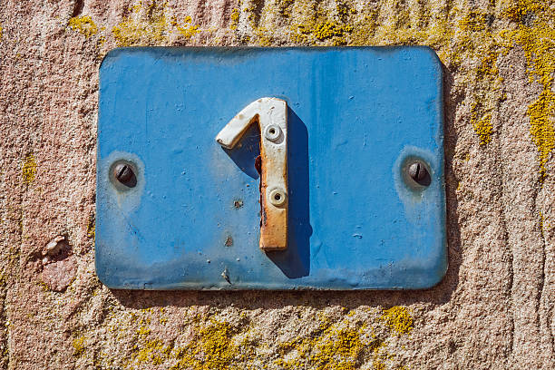 istock House wall with white number 1 on blue background 486184266