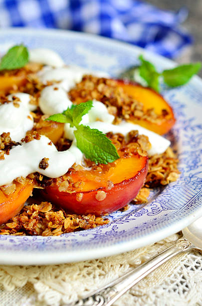 istock Grilled peachs with granola and whipped cream. 486190766