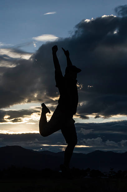 istock Silhouette of a beautiful man jumping 486198964