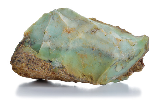 Rough green opal (chryzopal) veins. Uncut unpolished mineral isolated. Chryzopal from Szklary near Zabkowice Slaskie, Szklary serpentinite massif (Fore-Sudetic Block), Lower Silesia, Poland.