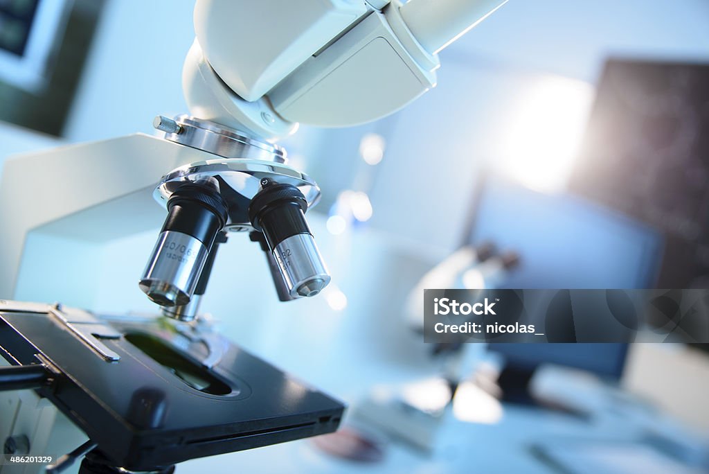 Laboratory Equipment A microscope inside a laboratory Microscope Stock Photo