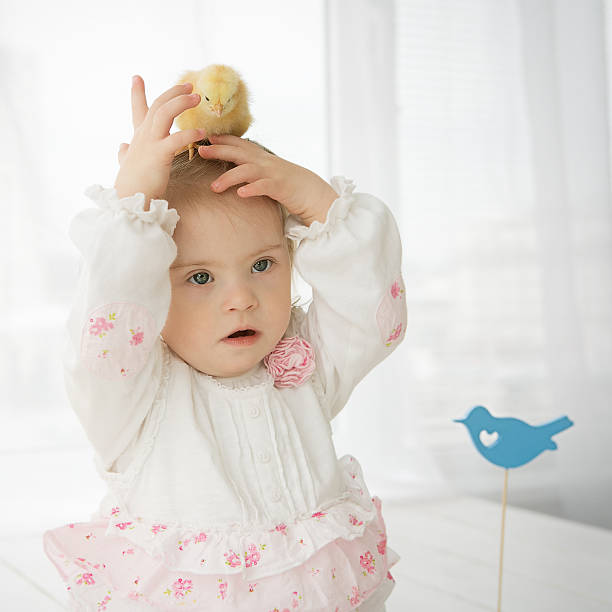 istock Little girl with Down syndrome 486202465