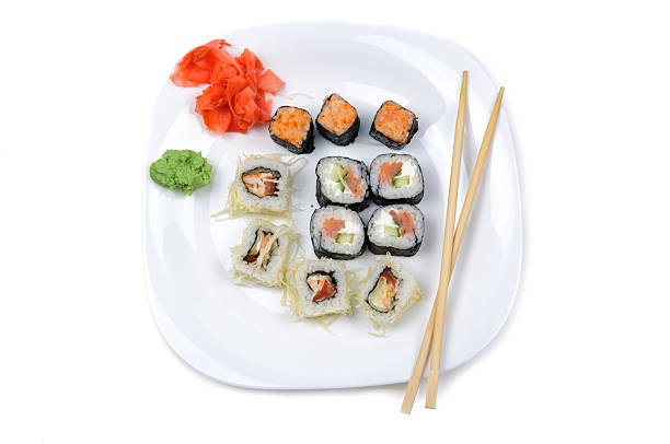istock Set of rolls on white plate isolated 486202993