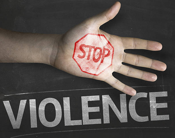 Educational and Creative composition with the message Stop Violence Educational and Creative composition with the message Stop Violence on the blackboard stop single word stock pictures, royalty-free photos & images