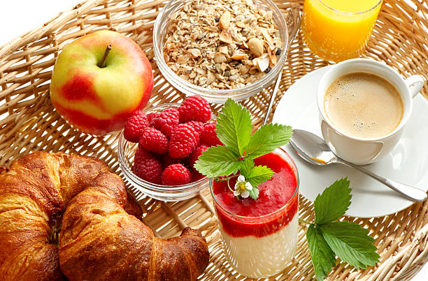 Breakfast with coffee, croissants, orange juice stock photo