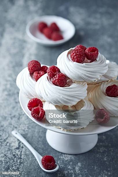 Meringue Nests With Raspberries Stock Photo - Download Image Now - Baked Pastry Item, Berry Fruit, Cake