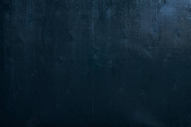 istock Black color wooden table top view. 486206564